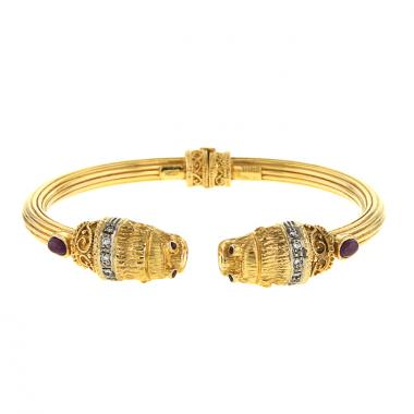 Brazalete redondo Lalaounis en oro amarillo,  diamantes y rubíes