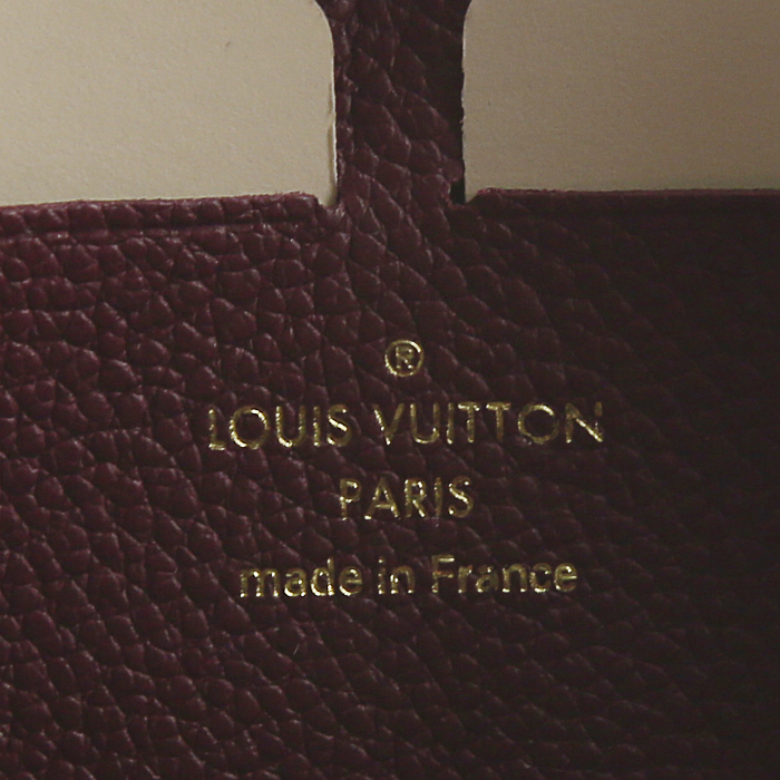Portefeuille Louis Vuitton Zippy en cuir monogram empreinte violet Raisin - Detail D3