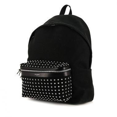 Zaino Saint Laurent in tela nera con decoro di borchie e pelle nera
