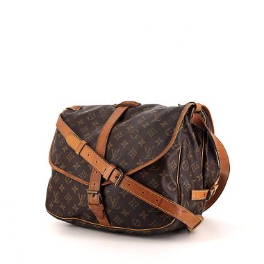 Sac bandoulière Louis Vuitton Saumur moyen modèle en toile monogram enduite marron et cuir naturel