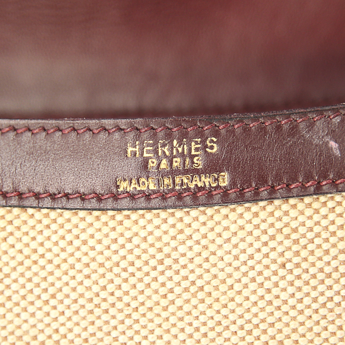 Hermes Constance handbag in burgundy leather and beige canvas - Detail D4