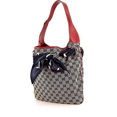 Bolso Cabás Gucci Positano en lona Monogram gris y cuero rojo