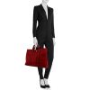 Hermès handbag in red and brown bicolor canvas - Detail D1 thumbnail