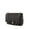 Chanel Timeless Maxi Jumbo handbag in black quilted grained leather - 00pp thumbnail