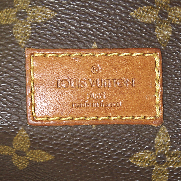 Sac bandoulière Louis Vuitton Saumur en toile monogram enduite marron et cuir naturel - Detail D3