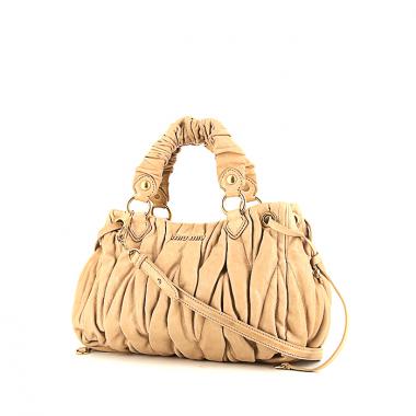 Bolso de mano Miu Miu en cuero beige