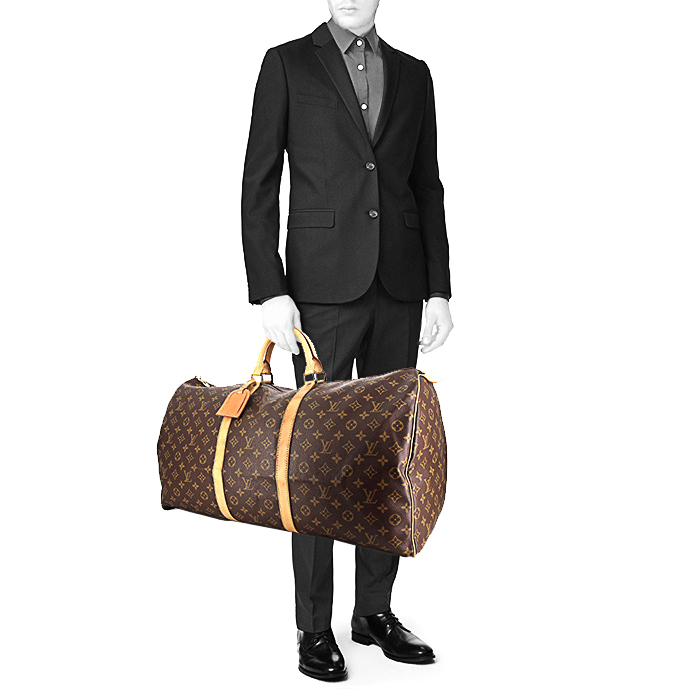 Louis Vuitton Keepall 60 cm travel bag in monogram canvas and natural leather - Detail D1