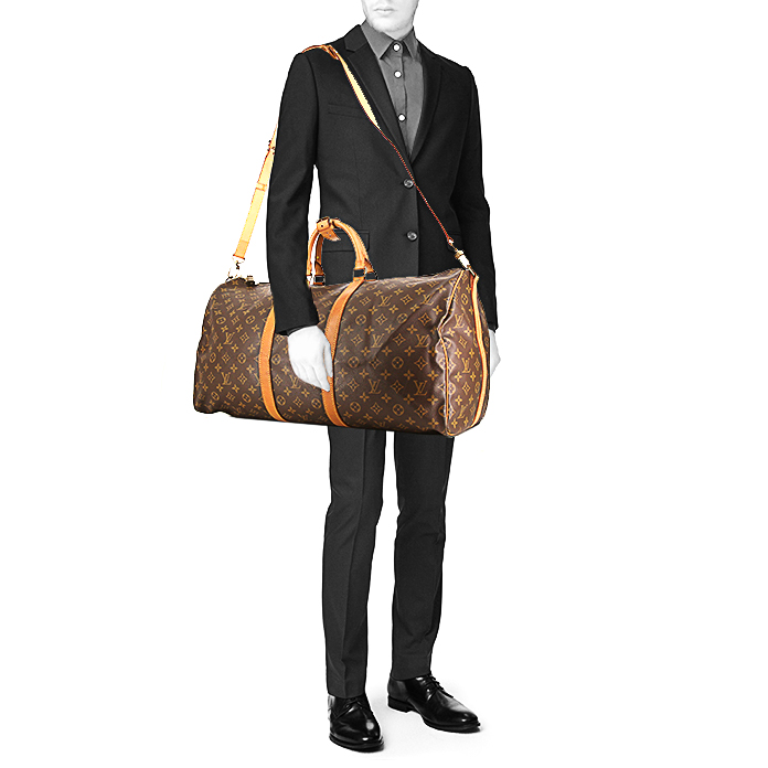 Louis Vuitton Keepall 55 cm travel bag in brown monogram canvas and natural leather - Detail D1