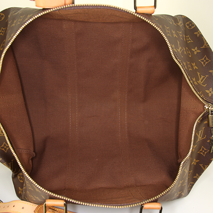Louis Vuitton Keepall 55 cm travel bag in brown monogram canvas and natural leather - Detail D4