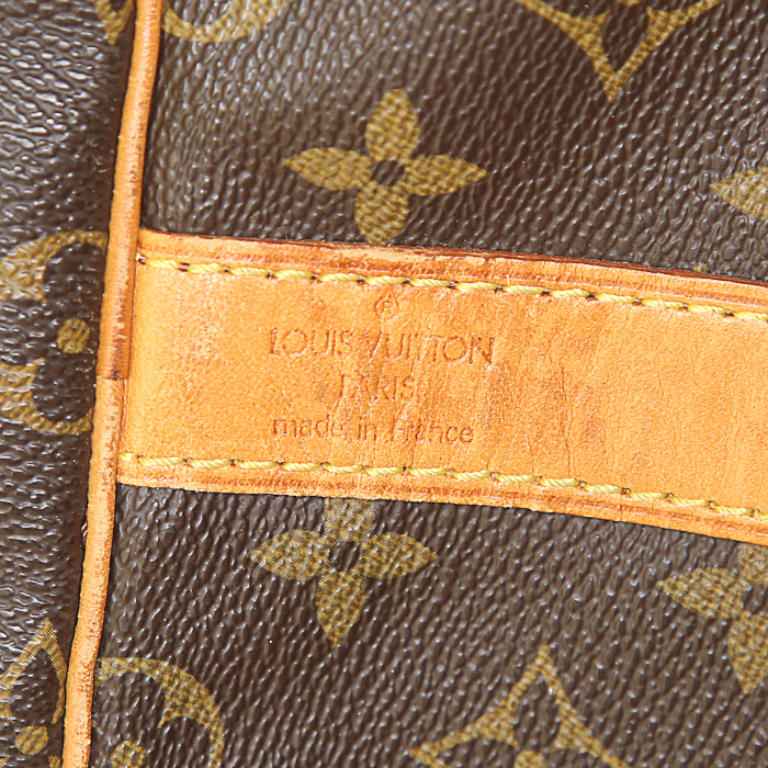 Louis Vuitton Keepall 55 cm travel bag in brown monogram canvas and natural leather - Detail D4