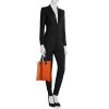 Shopping bag Hermès in tela arancione e pelle nera - Detail D1 thumbnail