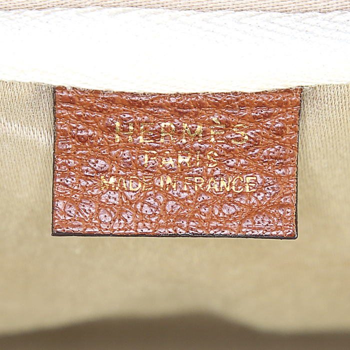 Hermes Victoria travel bag in brown togo leather and beige canvas - Detail D3