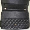 Chanel Timeless Maxi Jumbo handbag in black quilted grained leather - Detail D3 thumbnail