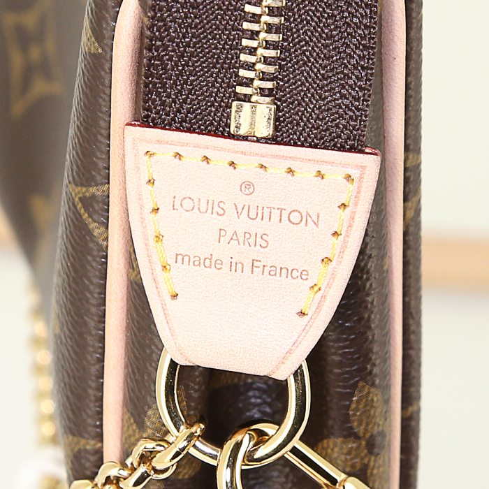 Bolso bandolera Louis Vuitton Eva en lona Monogram marrón y cuero natural - Detail D4