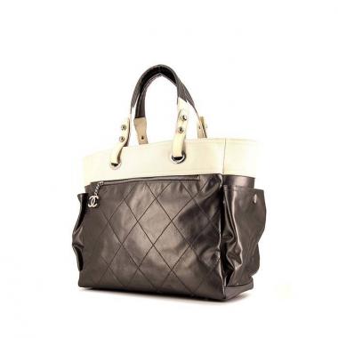 Chanel Paris-Biarritz shopping bag in golden brown and cream color canvas