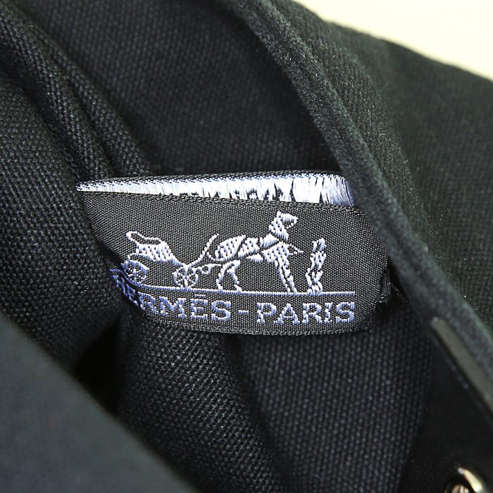 Hermes Troca shopping bag in black canvas and black leather - Detail D3