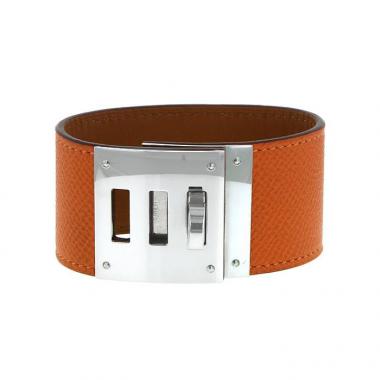 Brazalete Hermes Kelly en cuero naranja y paladio