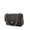 Chanel Timeless jumbo handbag in black quilted grained leather - 00pp thumbnail