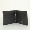 Louis Vuitton card wallet in black, blue and white taiga leather - Detail D1 thumbnail