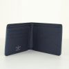Billetera Louis Vuitton Slender en cuero taiga azul - Detail D1 thumbnail