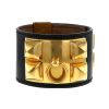 Bracelet manchette Hermes Médor en plaqué or jaune et cuir noir - 00pp thumbnail