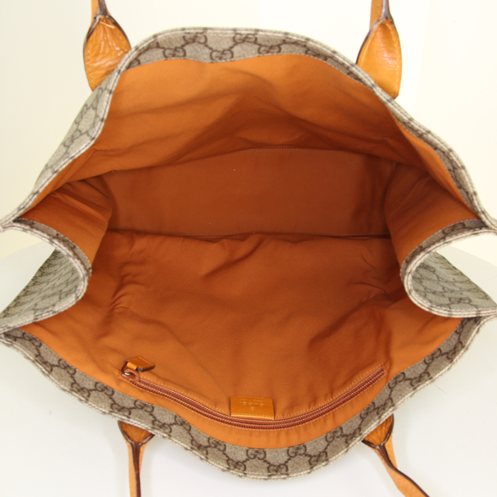 Bolso de mano Gucci en lona Monogram beige y cuero naranja - Detail D2