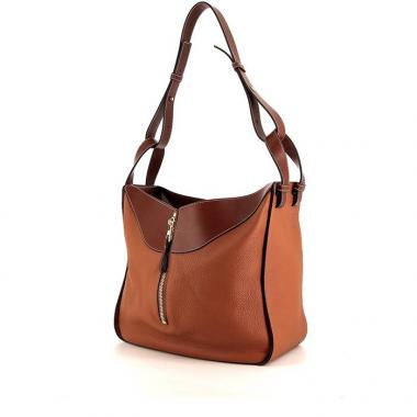Bolso de mano Loewe Hammock modelo grande en cuero bicolor color caramelo y marrón chocolate