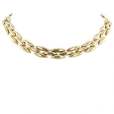 Collar ajustado época años 80 articulado Cartier Gentiane modelo mediano en oro amarillo