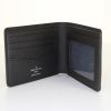Billetera Louis Vuitton Slender en cuero taiga negro - Detail D1 thumbnail