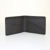 Louis Vuitton wallet in black leather - Detail D1 thumbnail