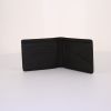 Billetera Louis Vuitton Slender en cuero granulado negro - Detail D1 thumbnail