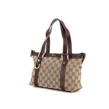 Borsa Gucci in tela monogram beige e pelle marrone