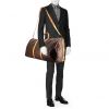 Bolsa de viaje Louis Vuitton Keepall 60 cm en lona Monogram marrón y cuero natural - Detail D2 thumbnail