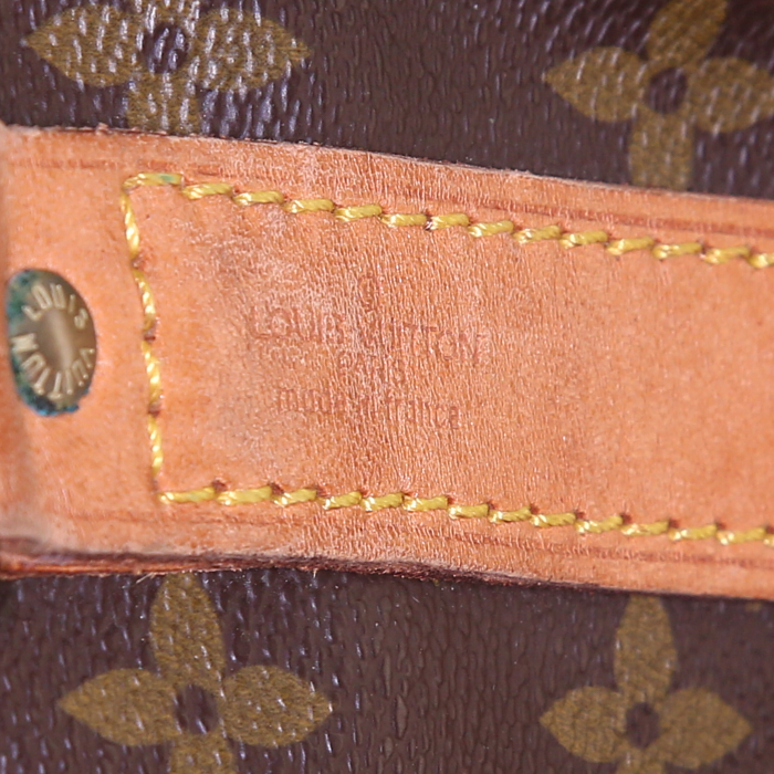 Louis Vuitton Keepall 55 cm travel bag in monogram canvas and natural leather - Detail D4