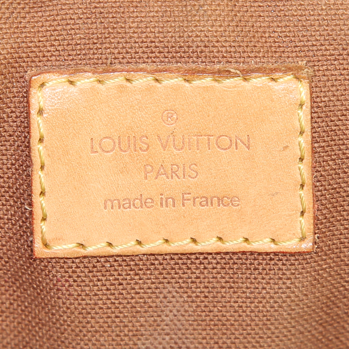 Bolso de mano Louis Vuitton Tivoli en lona Monogram marrón y cuero natural - Detail D3