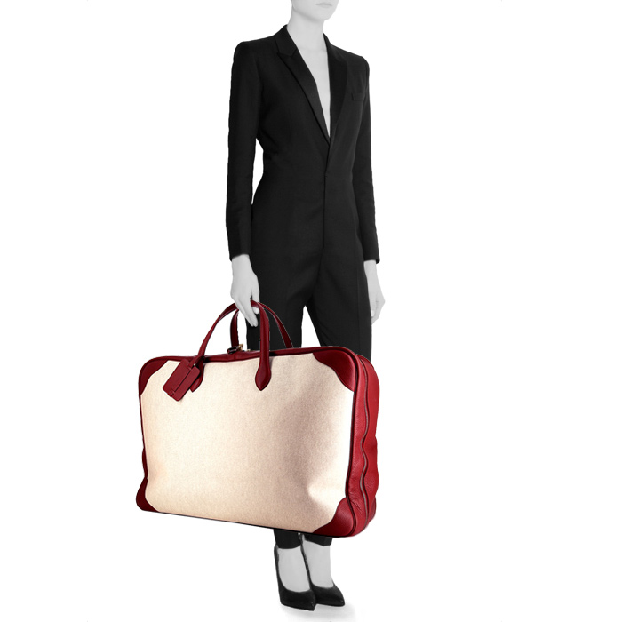 Bolsa de viaje Hermès en lona revestida beige y cuero togo rojo - Detail D1
