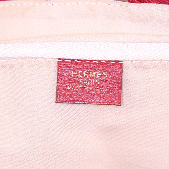 Hermès travel bag in beige coated canvas and red togo leather - Detail D3