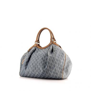 Shopping bag Gucci in tela denim monogram blu e pelle marrone
