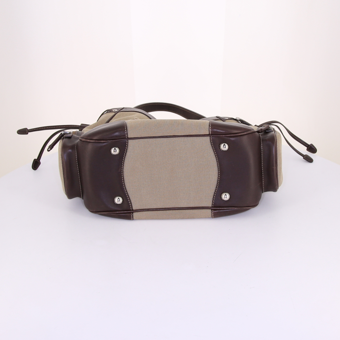 Prada Jacquard bag worn on the shoulder or carried in the hand in khaki logo canvas and dark brown leather - Detail D4