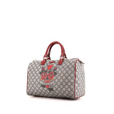 Bolso de mano Gucci Speedy en lona Monogram revestida y charol rojo