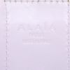 Shopping bag Alaïa in pelle bianca con motivo a fori e tessuto scamosciato nero - Detail D3 thumbnail