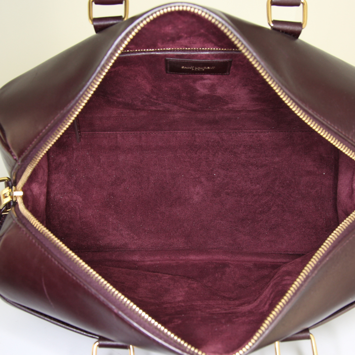 Saint Laurent Duffle handbag in burgundy leather - Detail D3