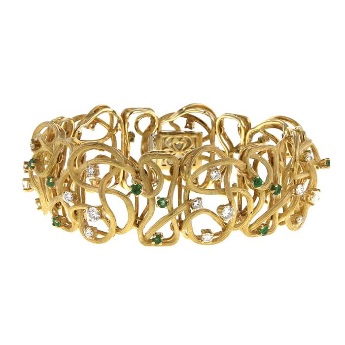 Brazalete época años 80 Vintage en oro amarillo,  diamantes y esmeralda