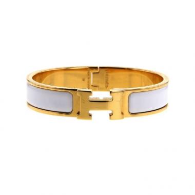 Bracciale apribile Hermes Clic Clac modello piccolo in oro placcato e smalto bianco