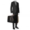 Bolsa de viaje Hermès Vintage en cuero negro y color oro - Detail D1 thumbnail
