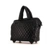 Bolsa de viaje Chanel Coco Cocoon en lona acolchada negra y cuero negro - 00pp thumbnail
