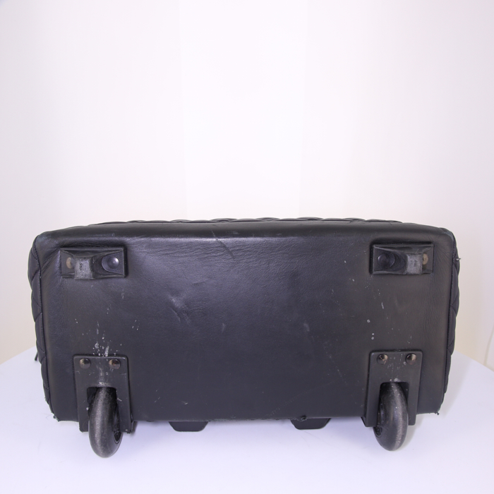 Bolsa de viaje Chanel Coco Cocoon en lona acolchada negra y cuero negro - Detail D4