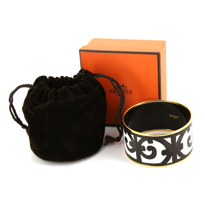 Bracelet manchette Hermès Balcon du Guadalquivir en métal doré,  émail blanc et émail noir