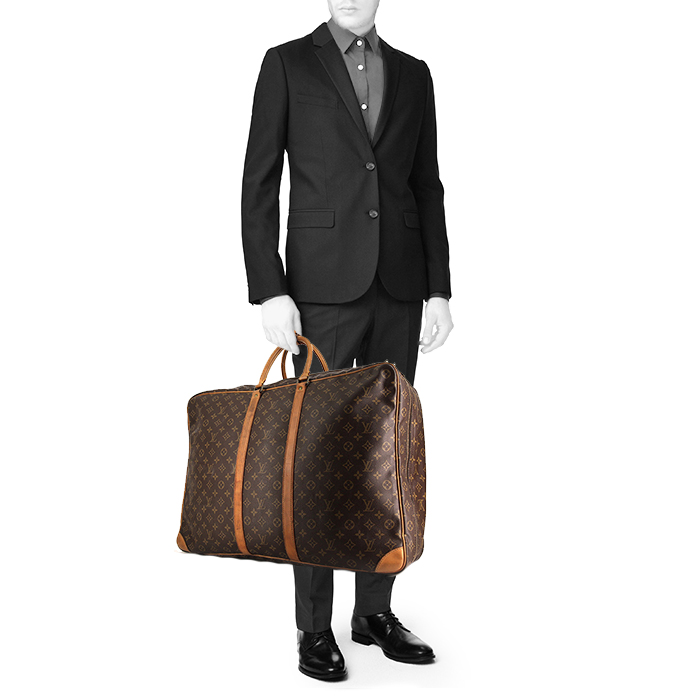 Louis Vuitton Sirius travel bag in monogram canvas and natural leather - Detail D1