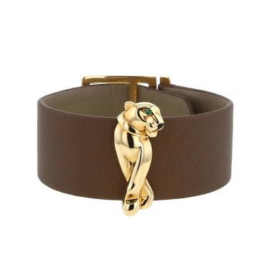 Bracelet manchette Cartier Panthère en or jaune,  onyx et tsavorites